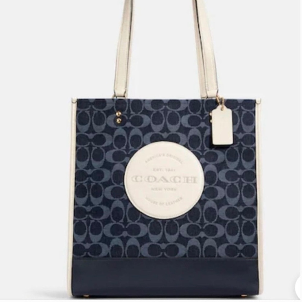 Coach Dempsey Tote Bag in Signature Jacquard with Stripe and Coach Patch.
